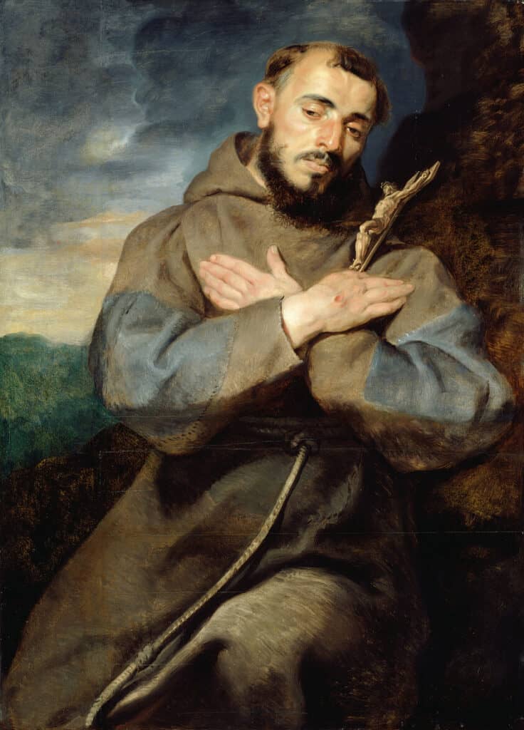 Saint François d'Assise par Peter Paul Rubens a les bras croisés. Il porte un crucifix et ses mains ont déjà reçu les stigmates lui infligeant la même douleur que le Christ. Il se découpe sur un ciel orageux bleu-gris foncé. 1615 Metropolitan Museum of Art