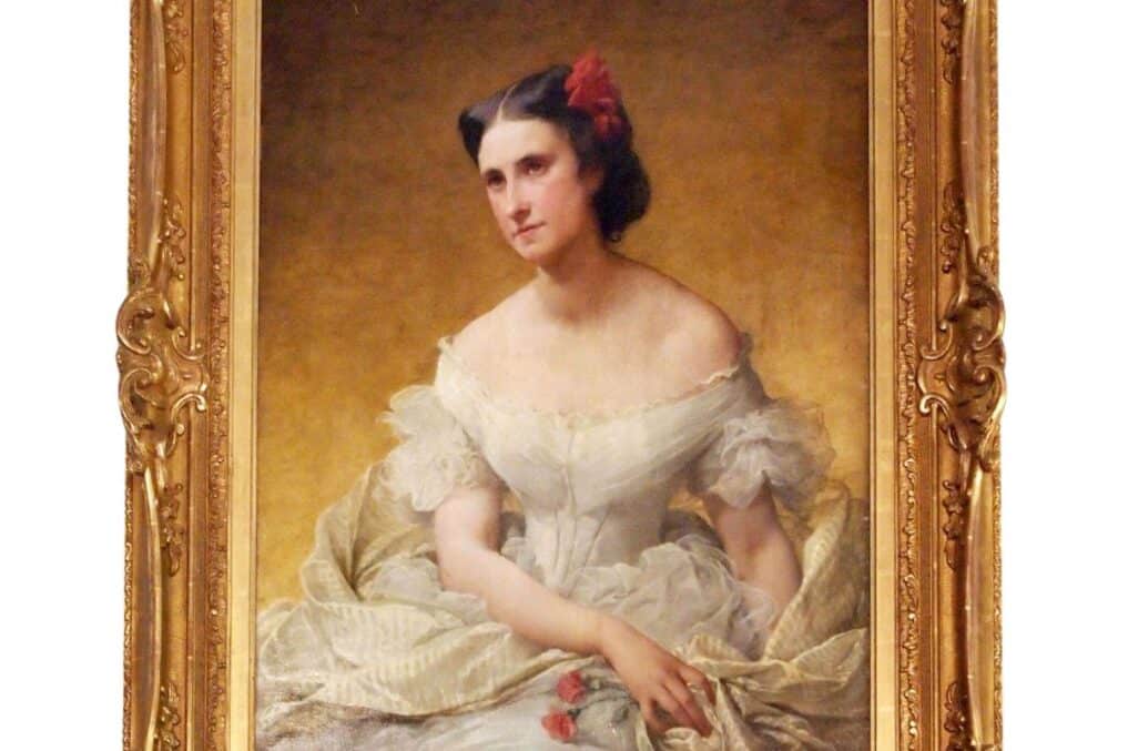 Portrait de femme par Adélaide Salles-Wagner, XIXe siècle, femme représentée dans une robe blanche typique de l'époque Napoléon III.