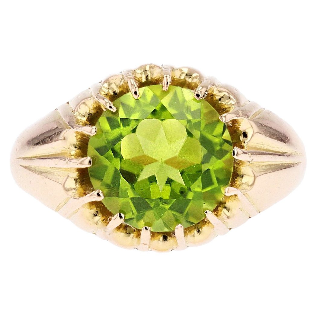 Anello in argento placcato oro con perla e peridoto