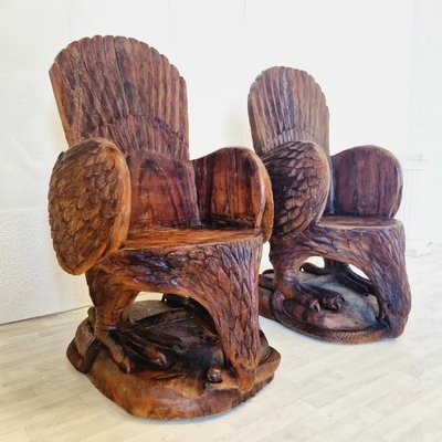 Coppia di poltrone American Eagle in legno massello intagliato
