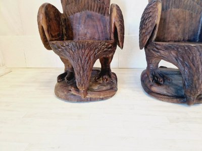 Coppia di poltrone American Eagle in legno massello intagliato