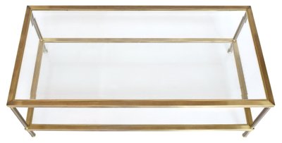 Table basse en laiton doré et deux plateaux en verre biseauté  