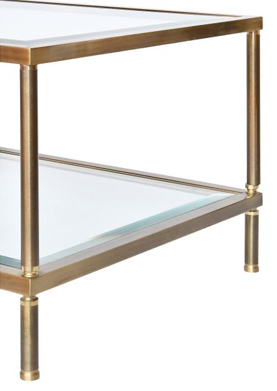 Table basse en laiton doré et deux plateaux en verre biseauté  