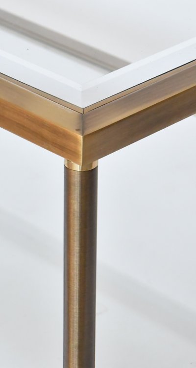 Table basse en laiton doré et deux plateaux en verre biseauté  