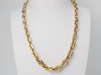 Collier maille forcat limée en chute en or jaune et diamant
