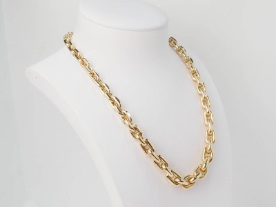 Collier maille forcat limée en chute en or jaune et diamant