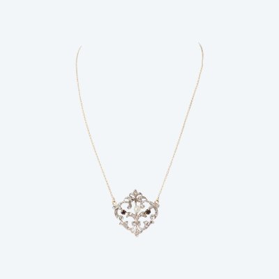 Collier volutes en or jaune et argent, grenat diamants et perle