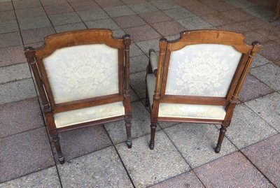Pair of Louis XVI armchairs with flat backs.