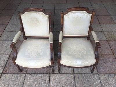 Pair of Louis XVI armchairs with flat backs.