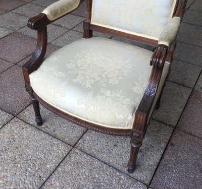 Pair of Louis XVI armchairs with flat backs.