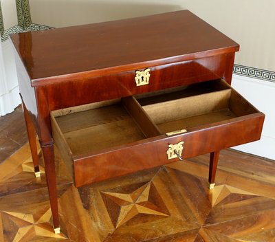Empire period mahogany dressing table with sliding top