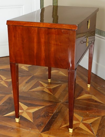 Empire period mahogany dressing table with sliding top