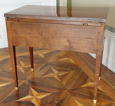 Empire period mahogany dressing table with sliding top