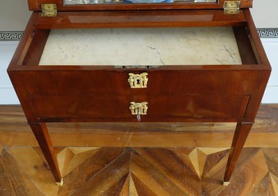 Empire period mahogany dressing table with sliding top