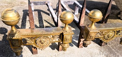 Pair of Louis XVI bronze and iron candlesticks, 19th century