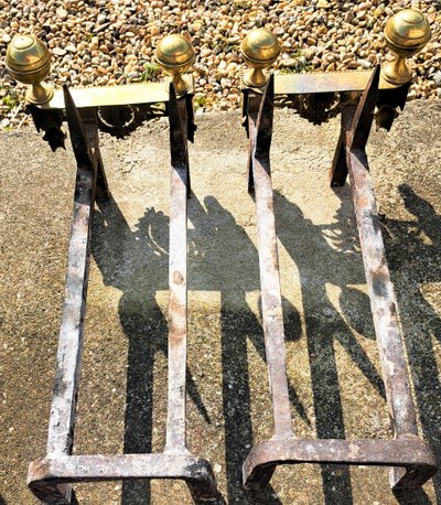Pair of Louis XVI bronze and iron candlesticks, 19th century
