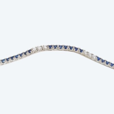 Bracciale fiume in oro bianco, zaffiri e diamanti