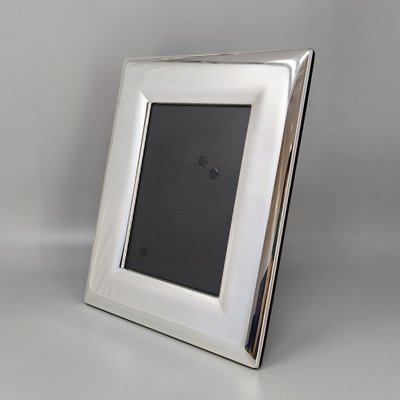 Superbe cadre photo des années 1970 en plaqué argent et verre. Fabriqué en Italie.