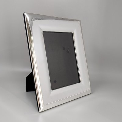 Superbe cadre photo des années 1970 en plaqué argent et verre. Fabriqué en Italie.