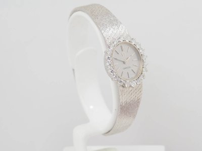 Montre Omega en or blanc et diamants
