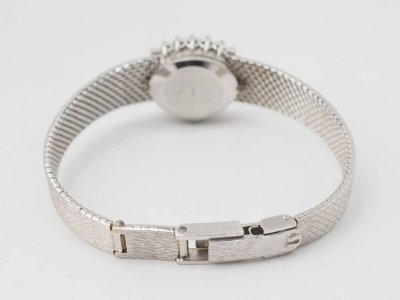 Montre Omega en or blanc et diamants
