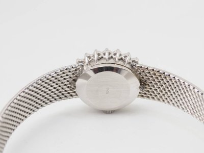 Montre Omega en or blanc et diamants