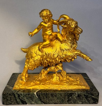 Sculpture en bronze doré Bacchus ou putto sur un bouc XIXè