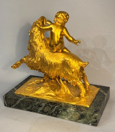 Sculpture en bronze doré Bacchus ou putto sur un bouc XIXè