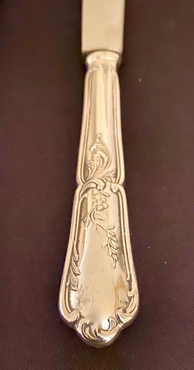 24 silver-plated knives