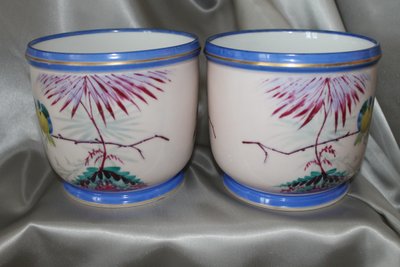 Pair of hand-painted Paris porcelain pot holders from the Louis Philippe period