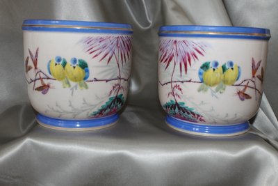 Pair of hand-painted Paris porcelain pot holders from the Louis Philippe period