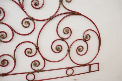Testiera letto matrimoniale in ferro rosso, inizio XX secolo