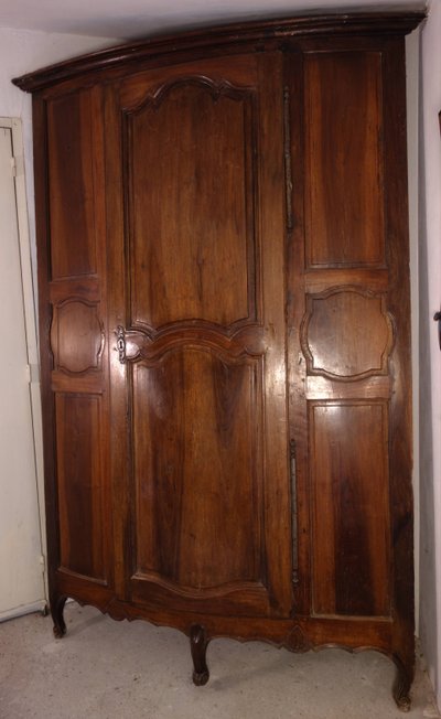 Curved walnut sideboard, Regency period