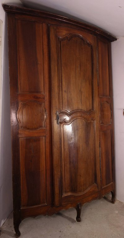 Curved walnut sideboard, Regency period