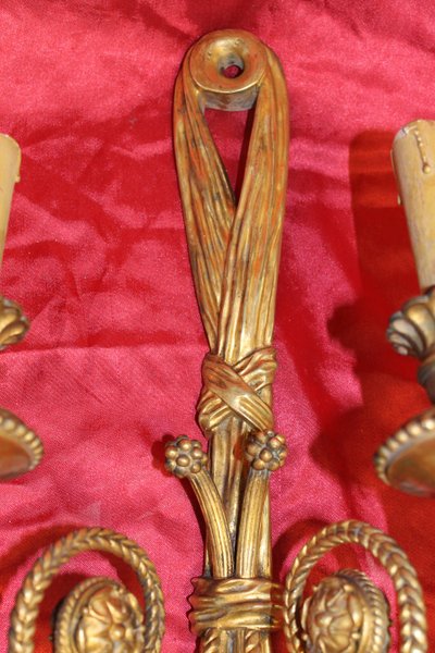 Pair of large bronze sconces with passementerie decoration in the 19th century Louis XVI style h: 60 cm