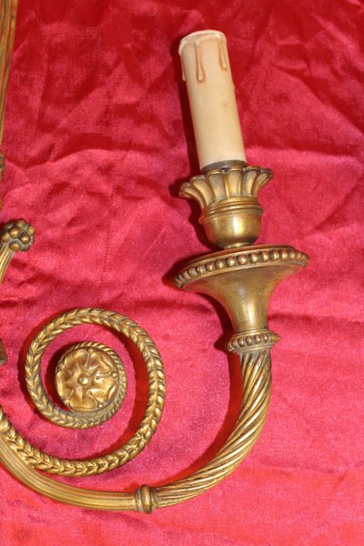 Pair of large bronze sconces with passementerie decoration in the 19th century Louis XVI style h: 60 cm