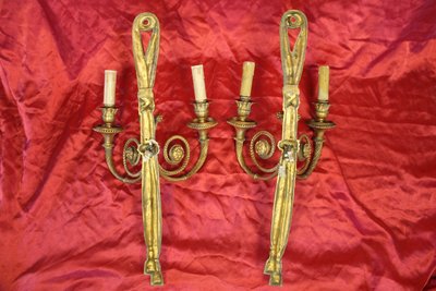 Pair of large bronze sconces with passementerie decoration in the 19th century Louis XVI style h: 60 cm