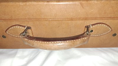 Light brown leather suitcase for men or women, early 20th century