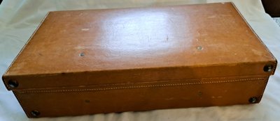 Light brown leather suitcase for men or women, early 20th century