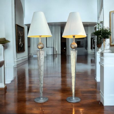 LARGE PAIR OF 70S LAMPS IN SILVER-PLATED METAL, 1.30 METRES HIGH