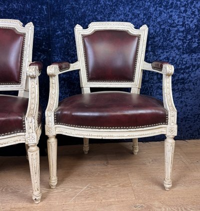 Pair of Louis XVI cabriolet armchairs in lacquered wood and leather circa 1850