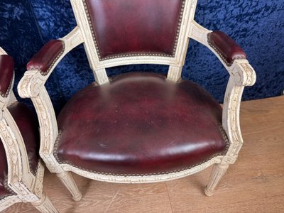 Pair of Louis XVI cabriolet armchairs in lacquered wood and leather circa 1850
