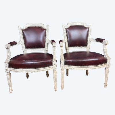 Pair of Louis XVI cabriolet armchairs in lacquered wood and leather circa 1850