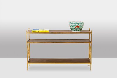 Casa Jansen. Console in ottone dorato e pelle fulva. Circa 1970.  LS64292509I
