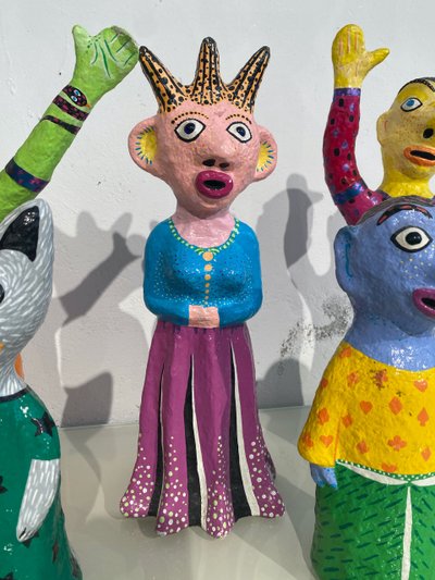 Papier-mâché sculptures "La petite famille" signed by artist Wabé and dated 2003