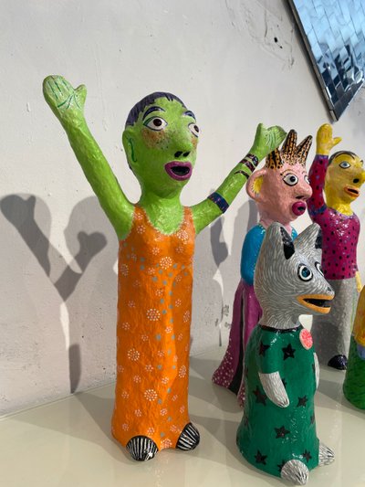 Papier-mâché sculptures "La petite famille" signed by artist Wabé and dated 2003