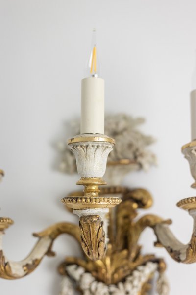 Pair of Louis XVI style sconces in gilded and lacquered wood. Circa 1900. LS5266457U
