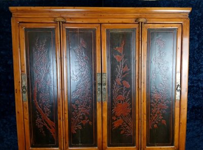 China, early 20th century: large lacquer cabinet with flower decorations