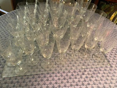 Set of 38 glasses and a carafe with stopper in fine crystal cut with diamond motifs, "50s" Years