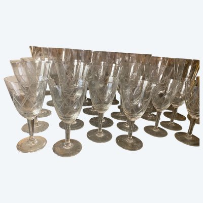 Set of 38 glasses and a carafe with stopper in fine crystal cut with diamond motifs, "50s" Years
